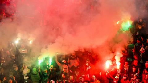 Celtic fans let offpyrotechnics at Easter Road