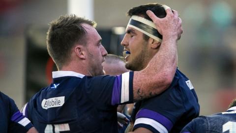 Scotland's Stuart Hogg and Stuart McInally celebrate against Argentina