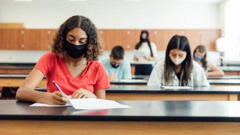 Pupils sitting tests wearing masks