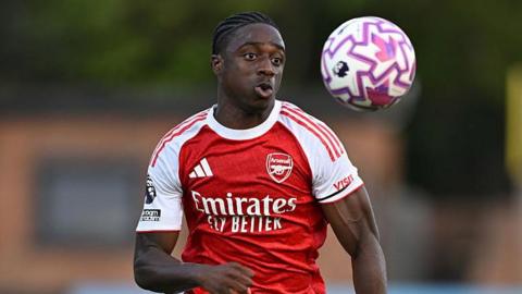 Arsenal's Ismeal Kabia stares at the bouncing ball as he chases after it trying to bring it under control