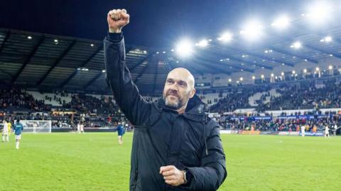 Luke Williams celebrating Swansea City's 2-1 victory over Luton Town at the Swansea.com Stadium