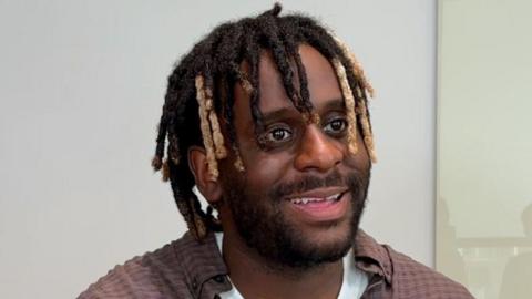 Myles Smith smiling