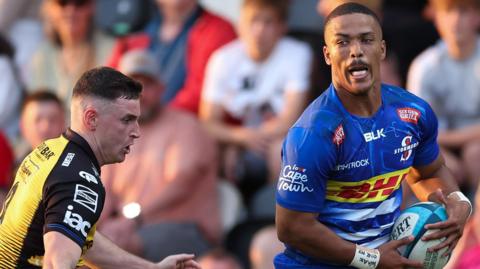 Stormers wing Angelo Davids sprints away to score the opening try against Dragons