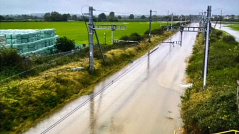 A flooded railway line in Swindon, Wiltshire