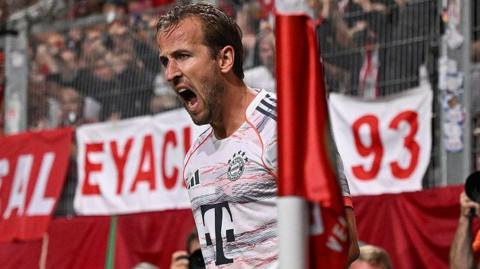 Harry Kane celebrates scoring for Bayern Munich