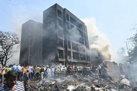 Building surrounded by smoke