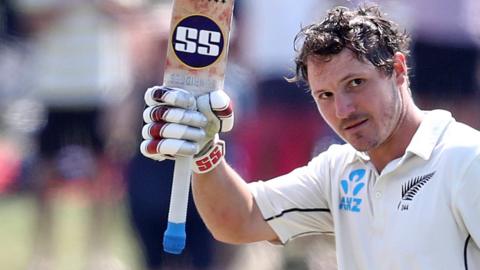 BJ Watling hold up his bat after notching 200 against England