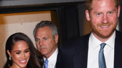 Harry and Meghan leave the Ziegfeld Ballroom on Tuesday night