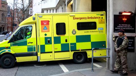 An ambulance is pictured leaving Wellington barracks as six hundred military personnel are deployed to provide cover for thousands of ambulance workers taking strike action on 11 January 2023 in London, United Kingdom