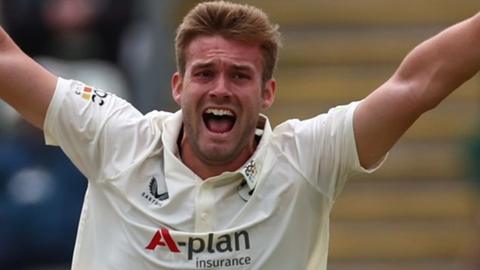 Adam Finch bowling for Worcestershire