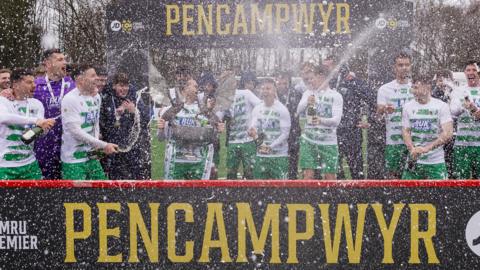 The New Saints players celebrate winning the Cymru Premier title