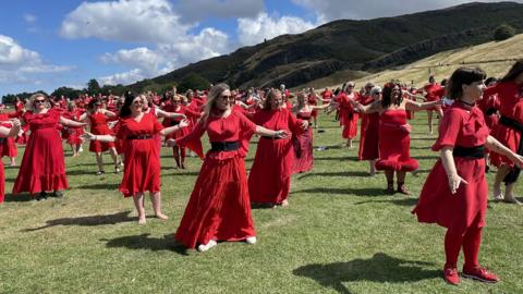 Kate Bush fans dance together in Edinburgh