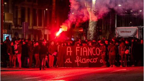 Demonstrators hold a banner in Torino during the demonstration of anarchists, protesting against the 41 bis regime for Alfredo Cospito, 14 January 2023