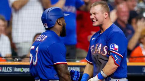 Adolis Garcia and Josh Jung celebrate a home run for the Texas Rangers