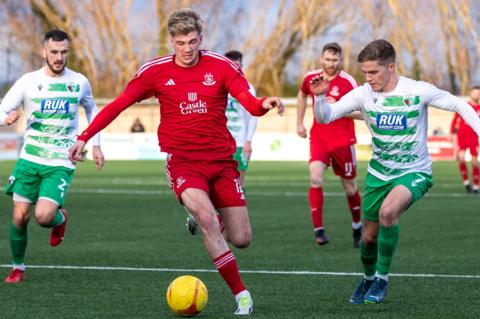 Connah's Quay Nomads' Harry Franklin in action against The New Saints' Josh Daniels