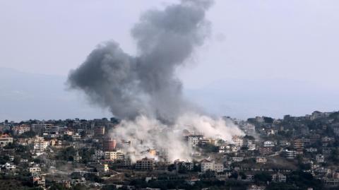 Plums of grey and white smoke rise from buildings in Lebanon.