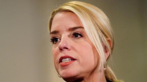 Attorney General Pam Bondi speaks to the media following a closed-door briefing. She has blonde hair. 