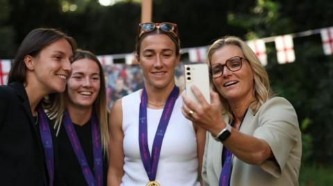 (L-R) England's Lotte Wubben-Moy, Lauren Hemp, Lucy Bronze and manager Sarina Wiegman participate in a video call with Prime Minister Sir Keir Starmer  in the garden at 10 Downing Street in London, Britain, 28 July 2025