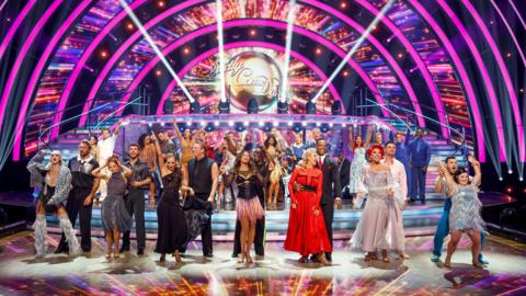 Strictly contestants and pro dancers in the Strictly Come Dancing studio