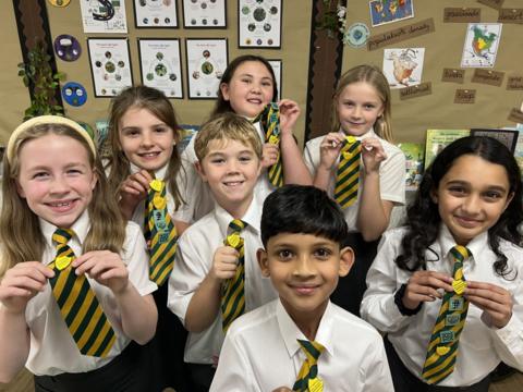 Anti-bullying ambassadors stood showcasing their anti-bullying badges.