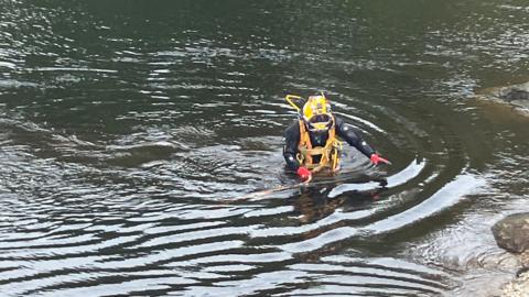 A diver in the River Lune