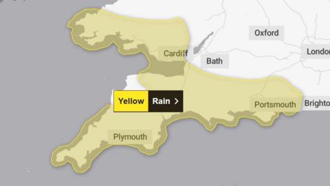 A Met Office weather warning for rain covering a large area of south England and south Wales. The warning is yellow.
