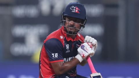 Nepal batter on his haunches at the end