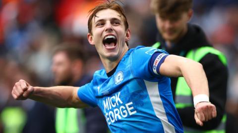 Hector Kyprianou celebrates following Peterborough United's win over Birmingham City in the EFL Trophy final at Wembley in April