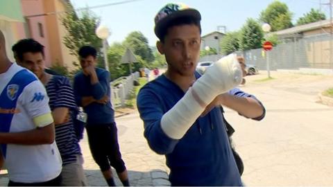 Man with injured arm