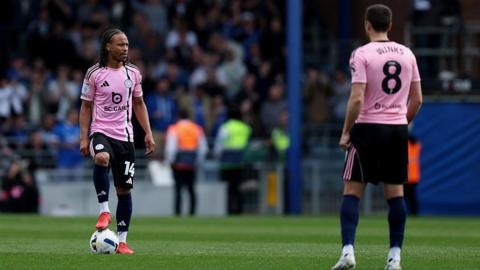 Leicester City's Bobby Decordova-Reid and Harry Winks prepare to restart the game 