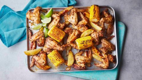 Piri-piri chicken wing, wedges and corn traybake