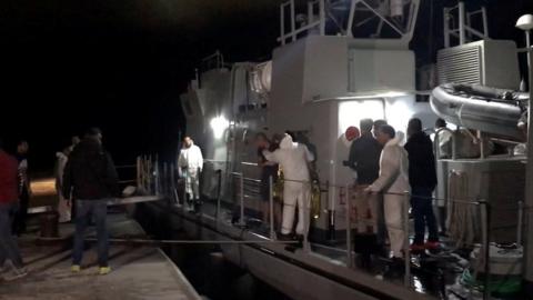 Survivors rescued by the Italian coastguard are brought to the port of Lampedusa, Italy October 7, 2019