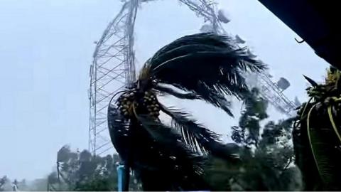 Telecom tower collapsing in wind
