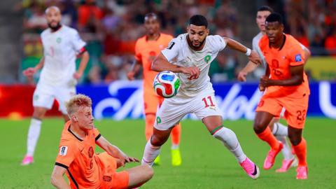 Ismael Saibari of Morocco dribbles the ball past Jan Paul Van Hecke of the Netherlands during the FIFA World Cup 2026 Round Of 32 match between Netherlands and Morocco