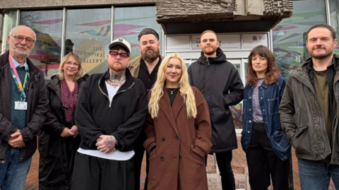 Members of the band stood alongside Leigh Councillors.