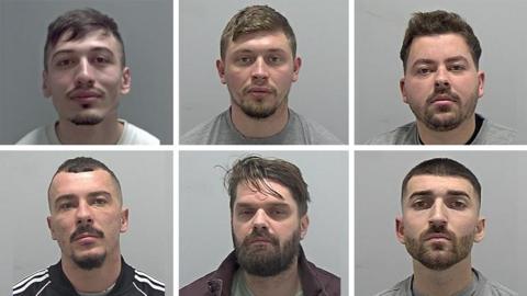 A composite image showing six mugshots of men arranged in two rows of three. Each person is photographed from the shoulders up against a plain, light grey background. They are wearing casual clothing, including t-shirts and a jacket. 
