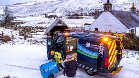 A Scottish and Southern Energy engineer provides a generator