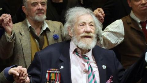 Sir Ian McKellen bows at the curtain call during the press night performance of Player Kings at the Noel Coward Theatre on April 11, 2024 in London, England.