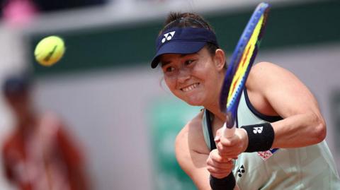 Joanna Garland playing at the French Open