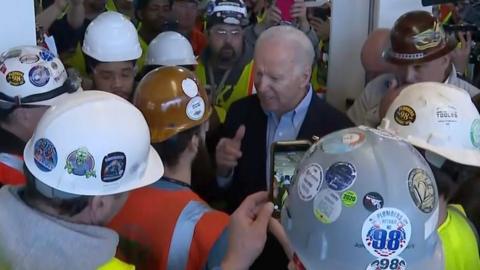 During a Michigan campaign stop, Joe Biden appeared to threaten a factory worker as they had a heated argument.