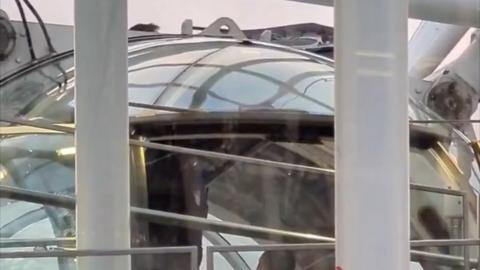 A close up of a pod on the London Eye