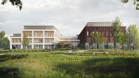 An artists impression of a hospital building, with a brown building on the right and white building on the left surrounded by lots of grass and trees.