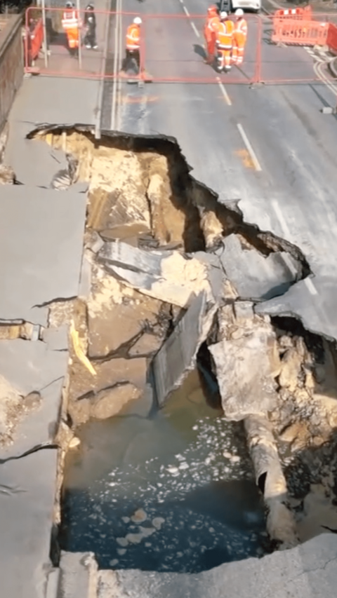 Aerial shot of large sinkhole in street