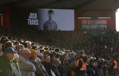 A minute silence being held in memory of Joshua Travis, 14, at the City Ground in Nottingham