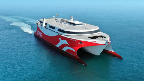 A red and white high speed passenger ferry at sea