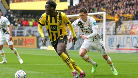 Borussia Dortmund player Abdoulaye Kamara in action