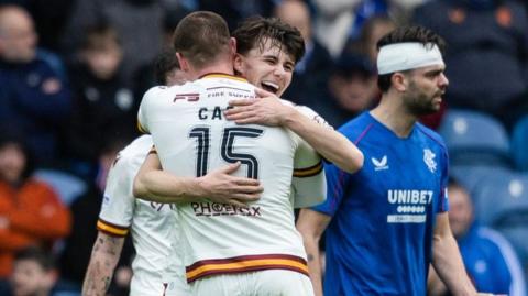 Motherwell celebrate an Ibrox win for the second successive season