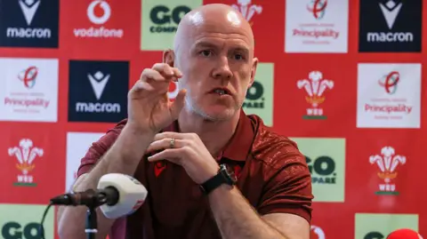 Steve Tandy speaks to media