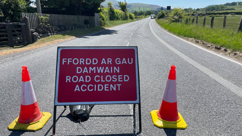 road closed sign on A494