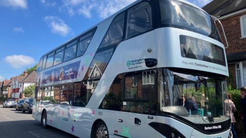 Bus with blue sky in the background